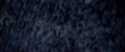 a close up of a cell phone with a blurry background