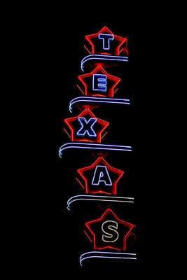 a black background with a red and blue neon sign