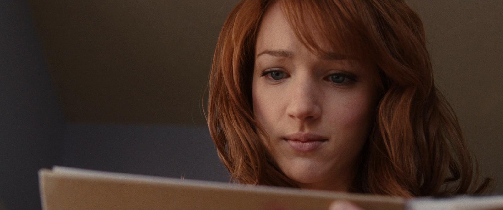 a close up of a person reading a book