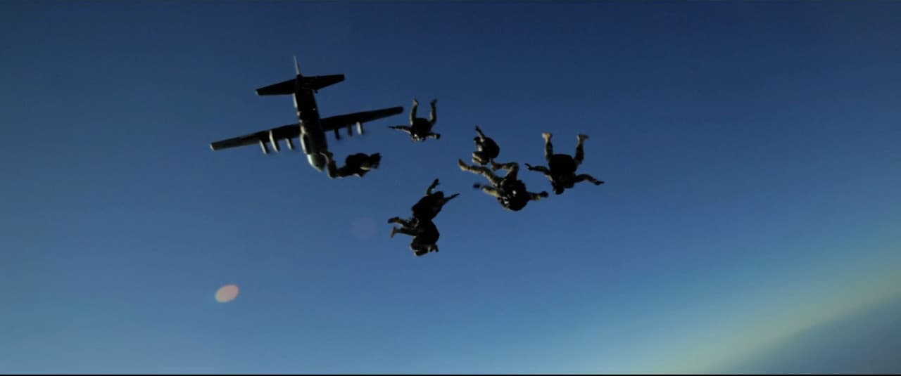 a group of people that are flying in the air
