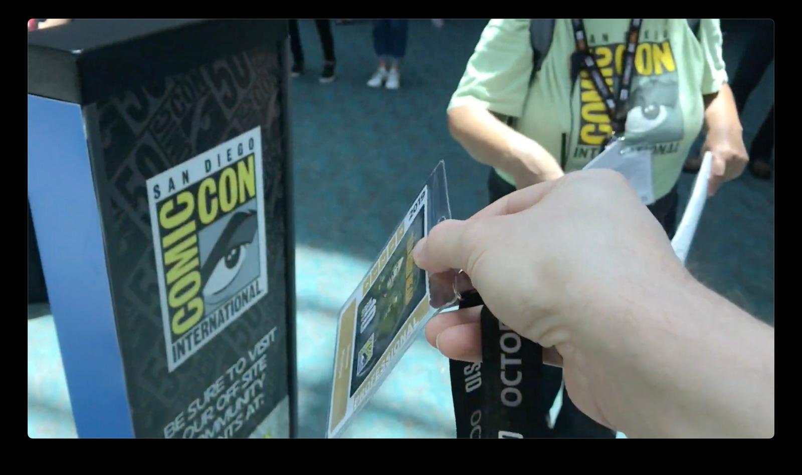a person holding a pair of scissors in their hand