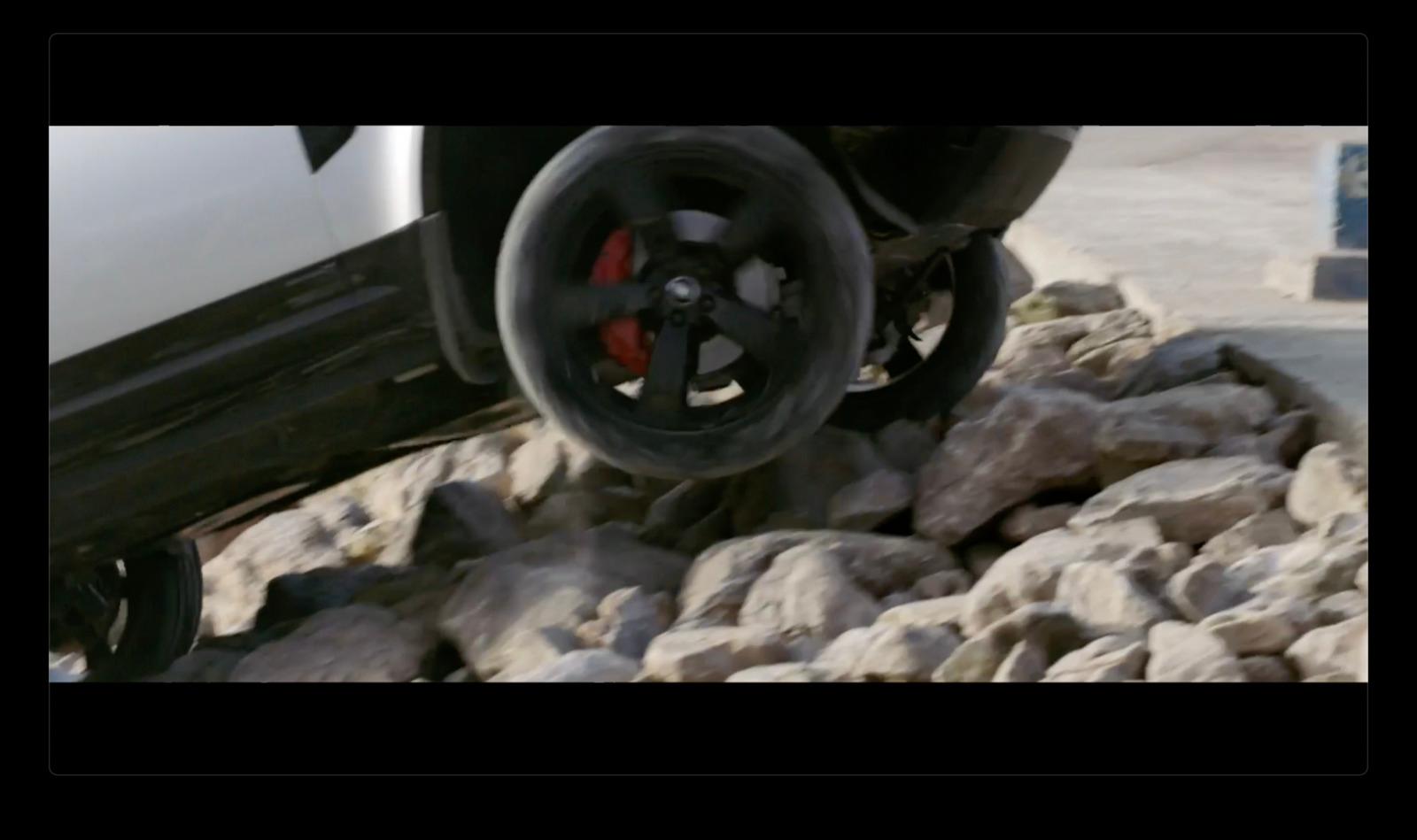 a close up of a tire on a white truck