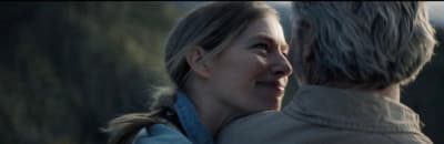 a man and a woman standing next to each other