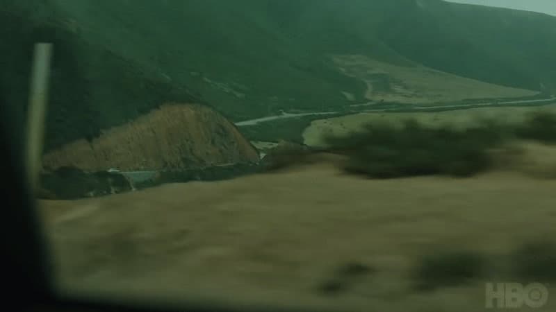 a view of a valley from a vehicle window