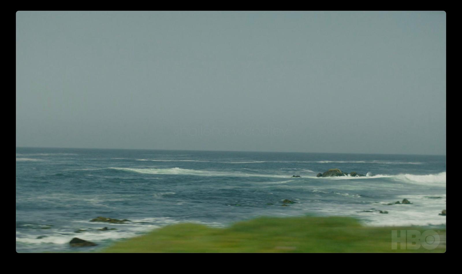 a view of a body of water from a hill