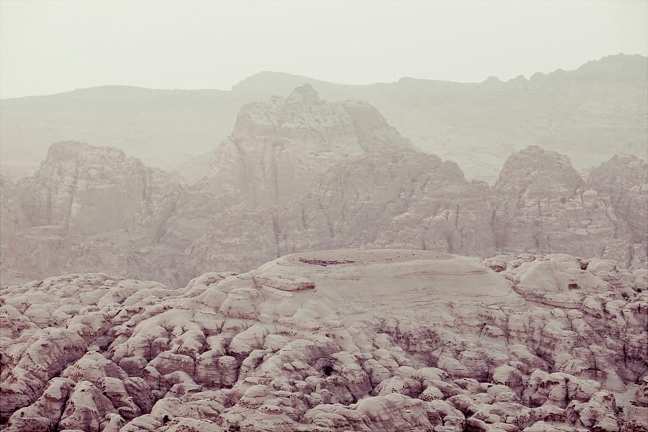 a mountain range covered in snow and rocks