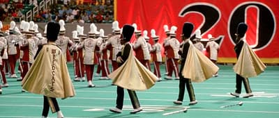 a group of toy soldiers standing on top of a field