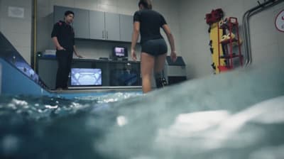 a man and a woman standing in a room