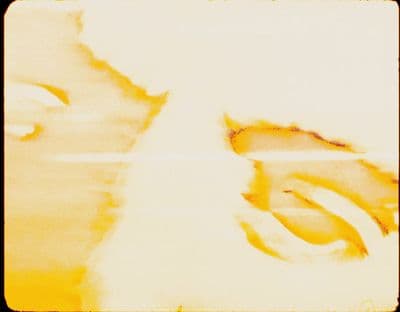 a picture of a woman's face with her eyes closed