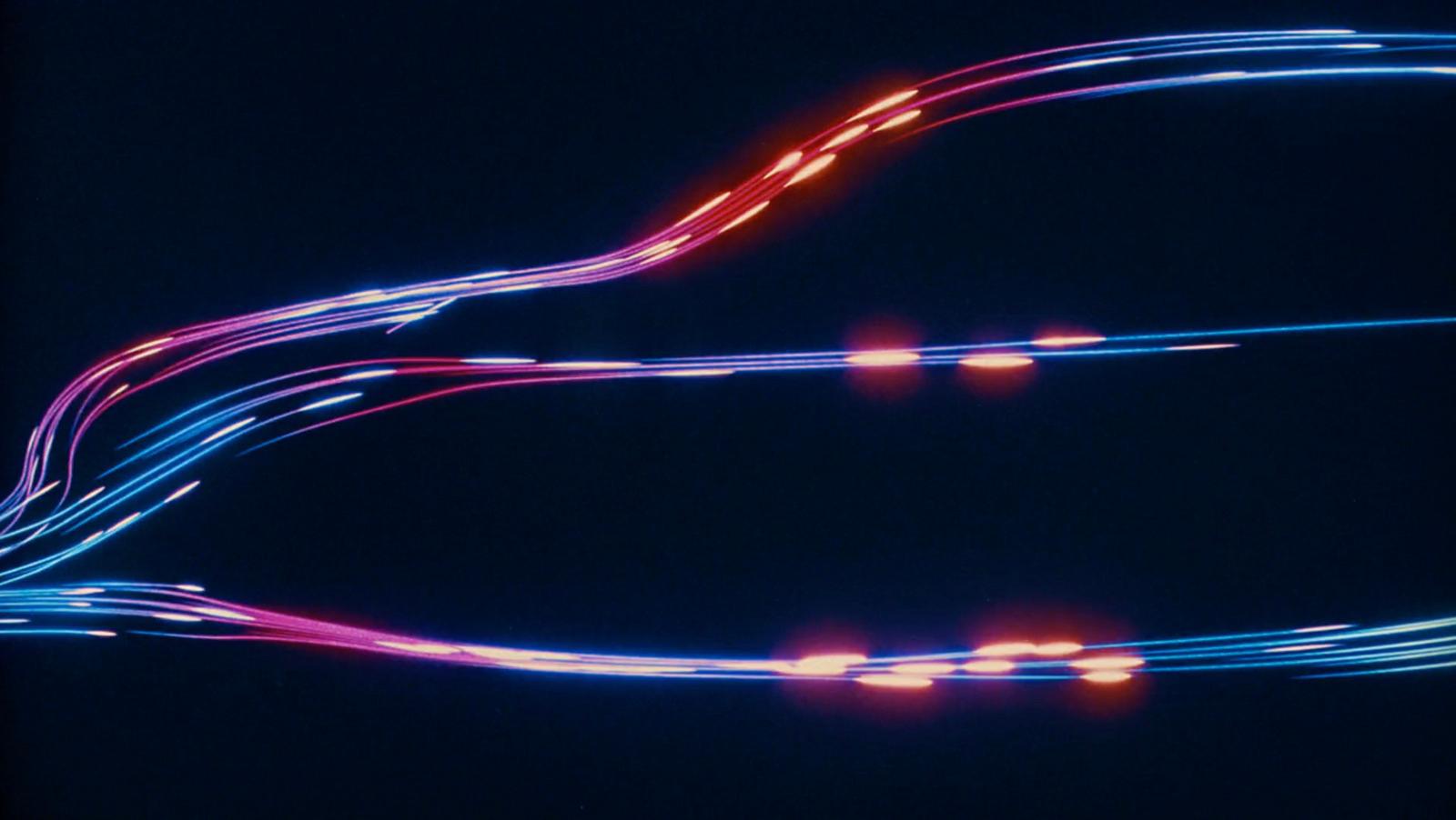a close up of a pair of blue and red wires
