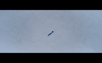 a person on skis is being pulled by a rope
