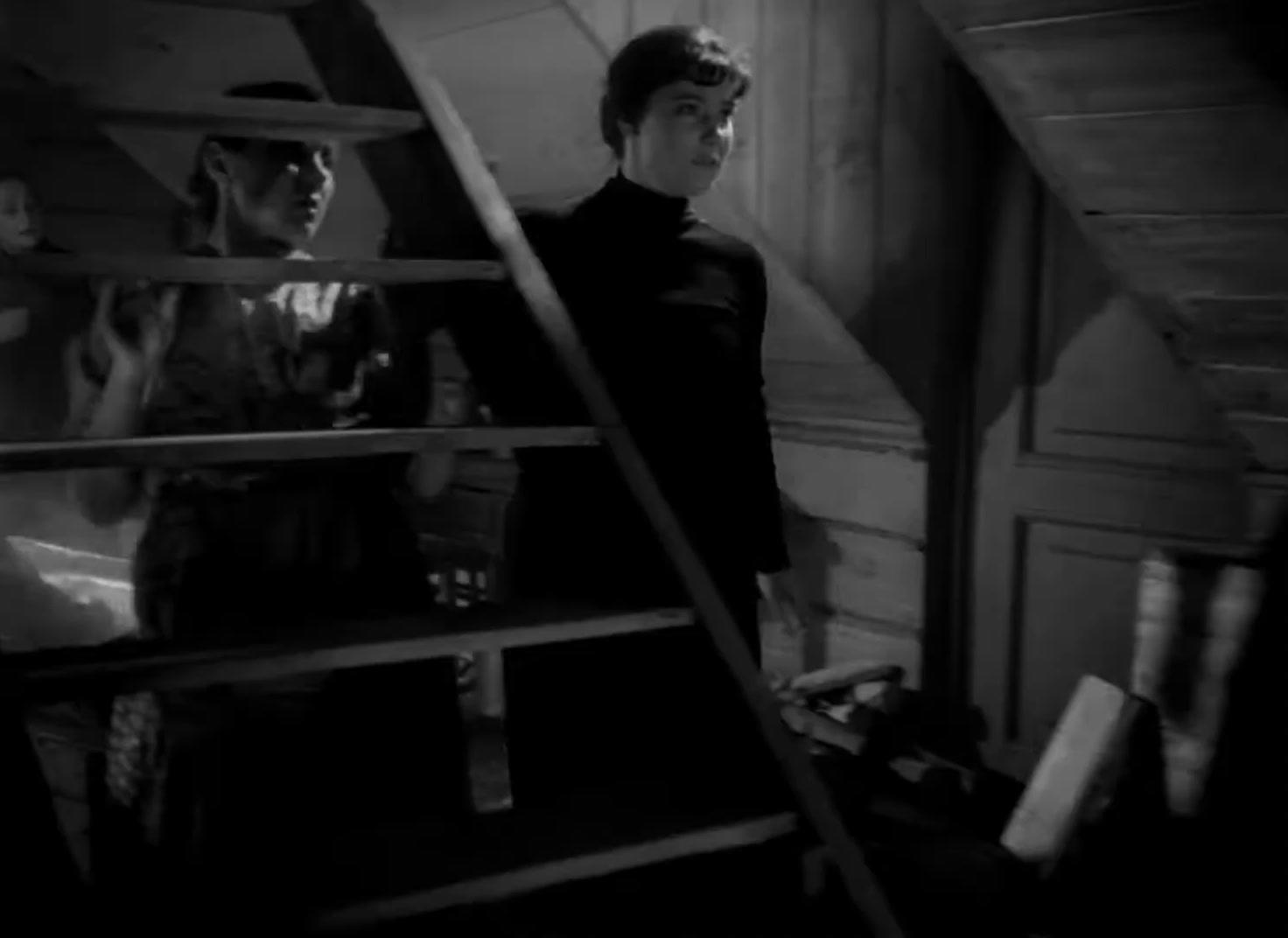 a man standing on top of a set of stairs