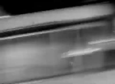 a blurry photo of a person on a skateboard