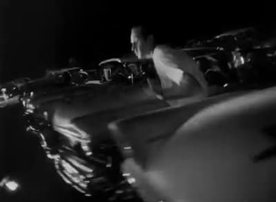 a black and white photo of a car engine