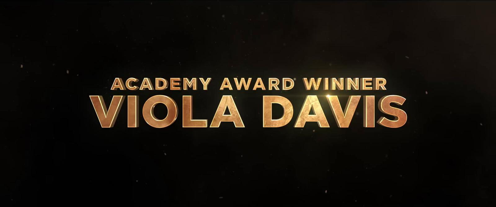a black background with a gold text that reads academy award winner viola davis