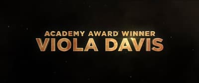 a black background with a gold text that reads academy award winner viola davis