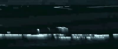 a blurry photo of a city at night