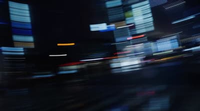 a blurry photo of a city at night