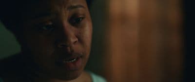 a woman with a concerned look on her face