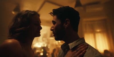 a man standing next to a woman in a room