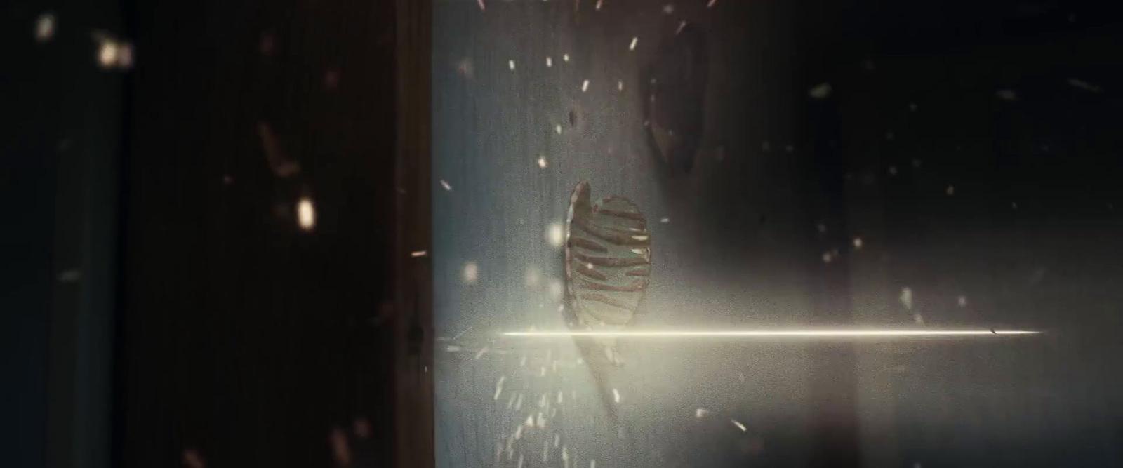 a window with a light shining through it