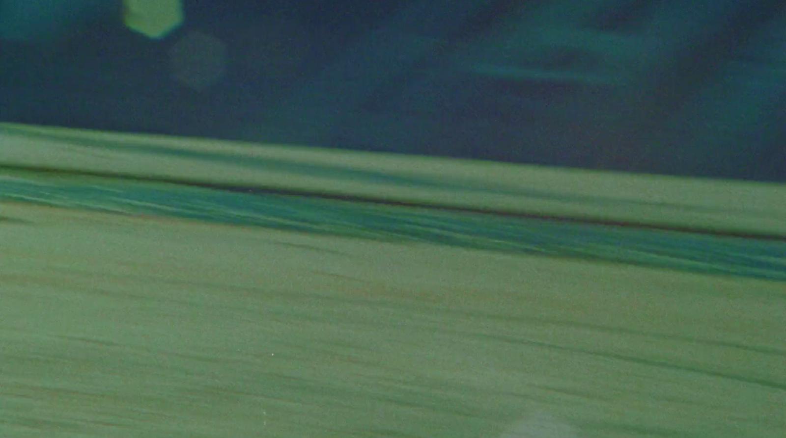 a man riding a skateboard down the side of a ramp