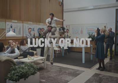 a group of people standing in a room