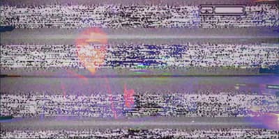 a television screen with a man's face on it