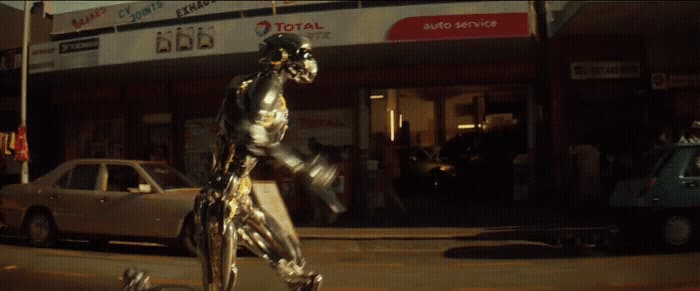 a statue of a man walking down a street