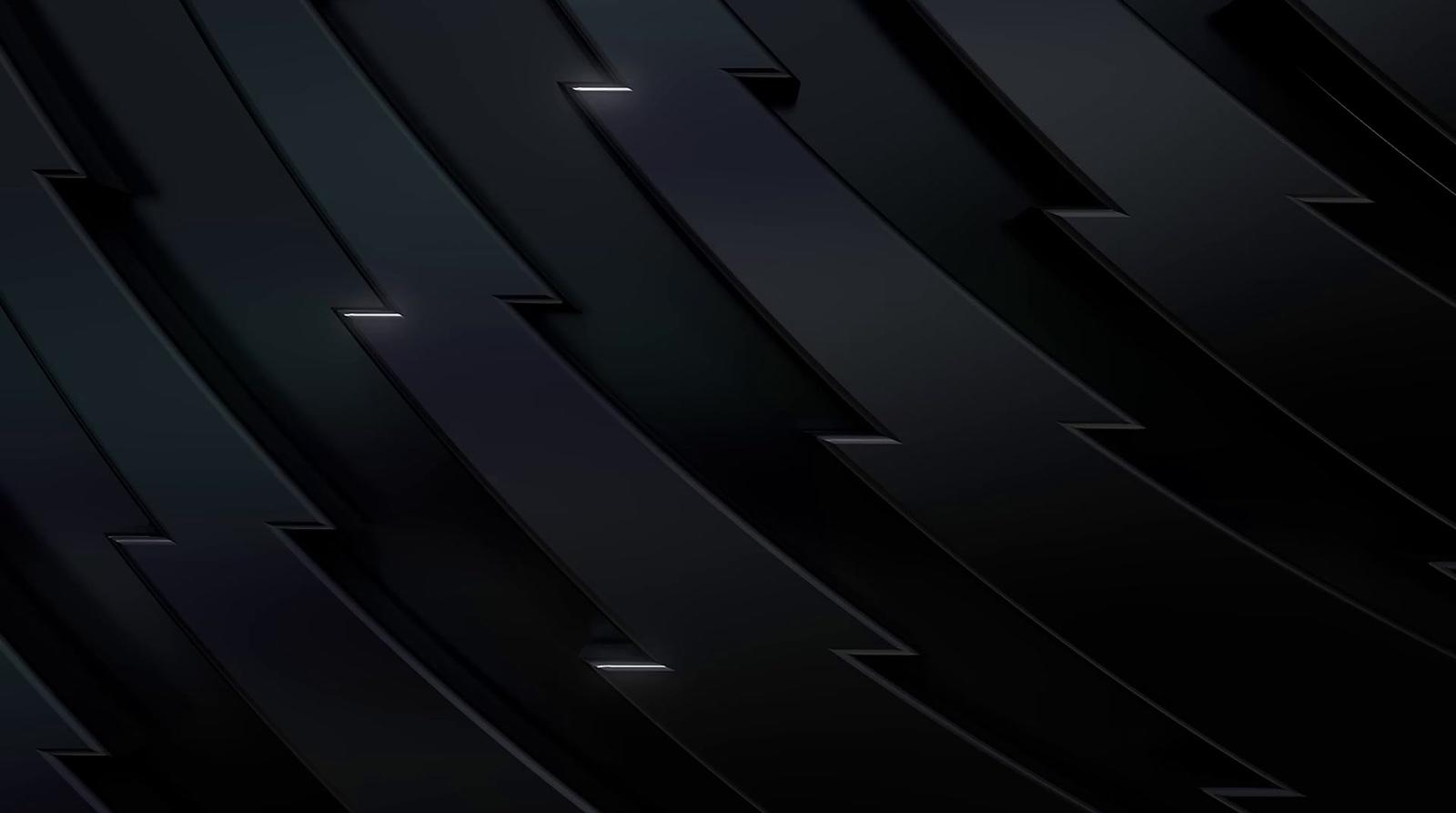 a cell phone with a black background and a black wall