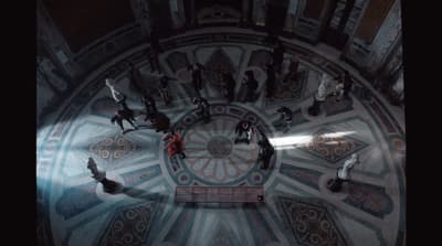 a group of people standing around a large clock