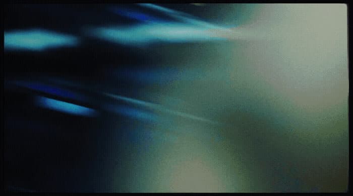 a blurry image of a blue and green background