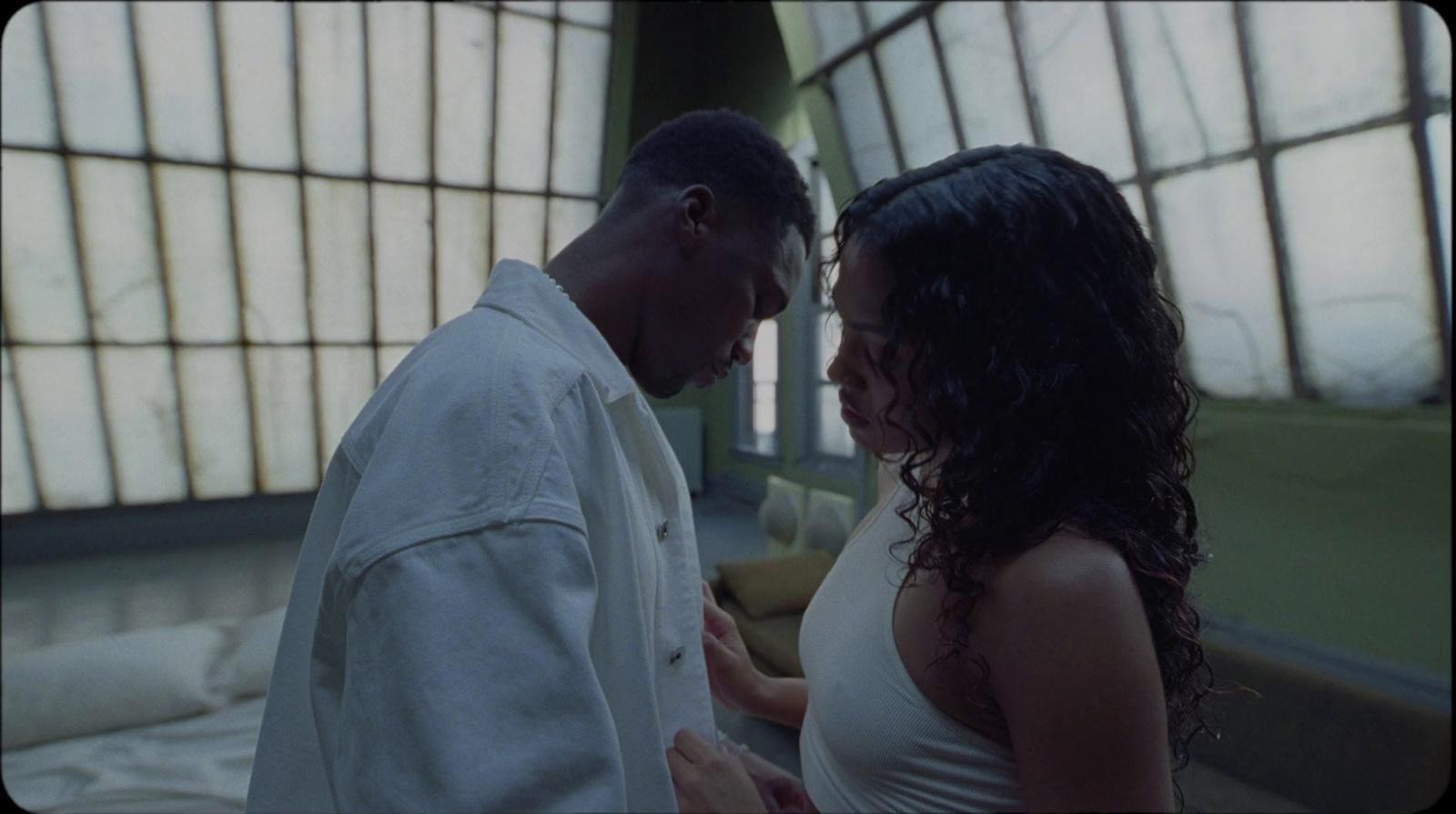 a man and a woman standing next to each other