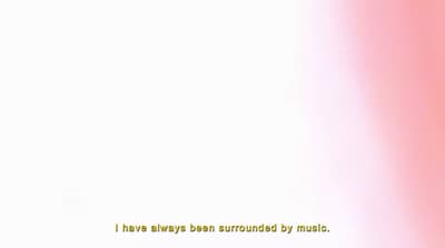a pink and white background with a quote on it