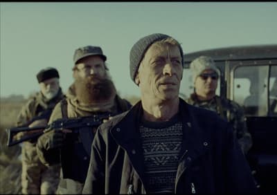 a group of men standing next to each other
