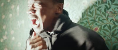a man with his mouth open and his mouth wide open