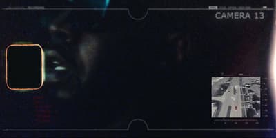 a man's face is shown through a camera lens