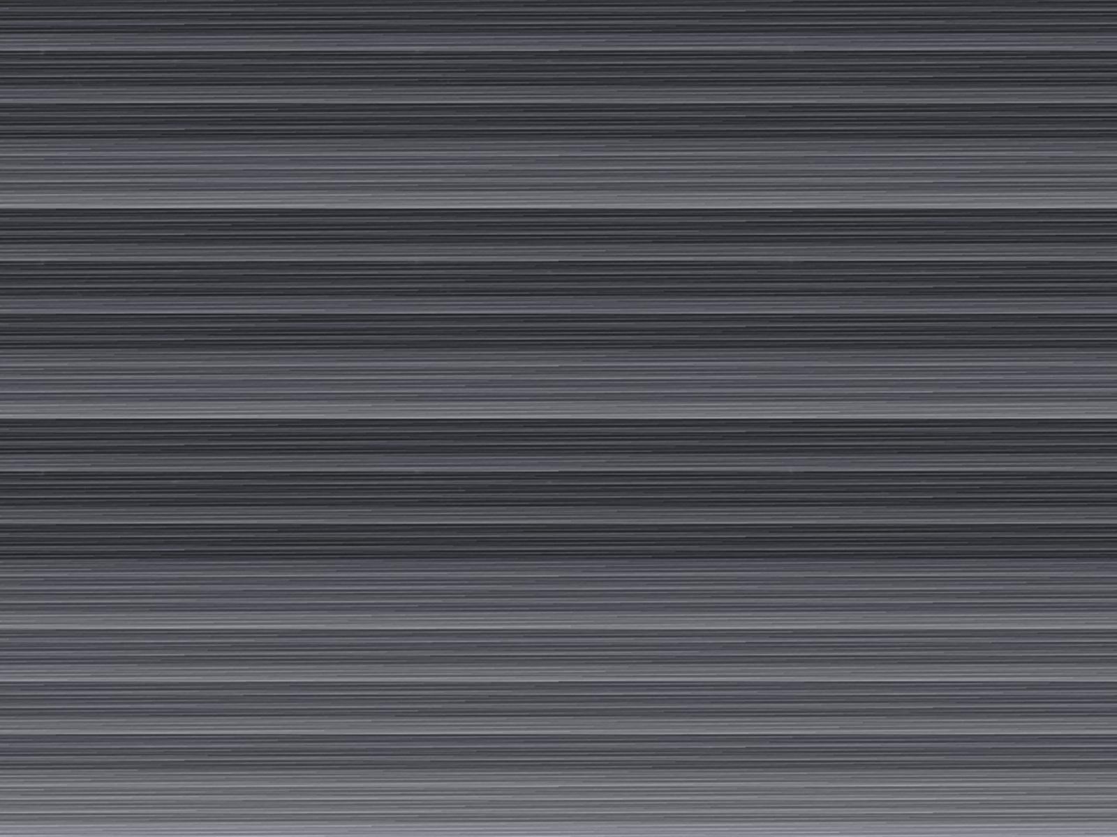 a black and white striped wallpaper with vertical lines