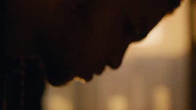 a close up of a person holding a cell phone