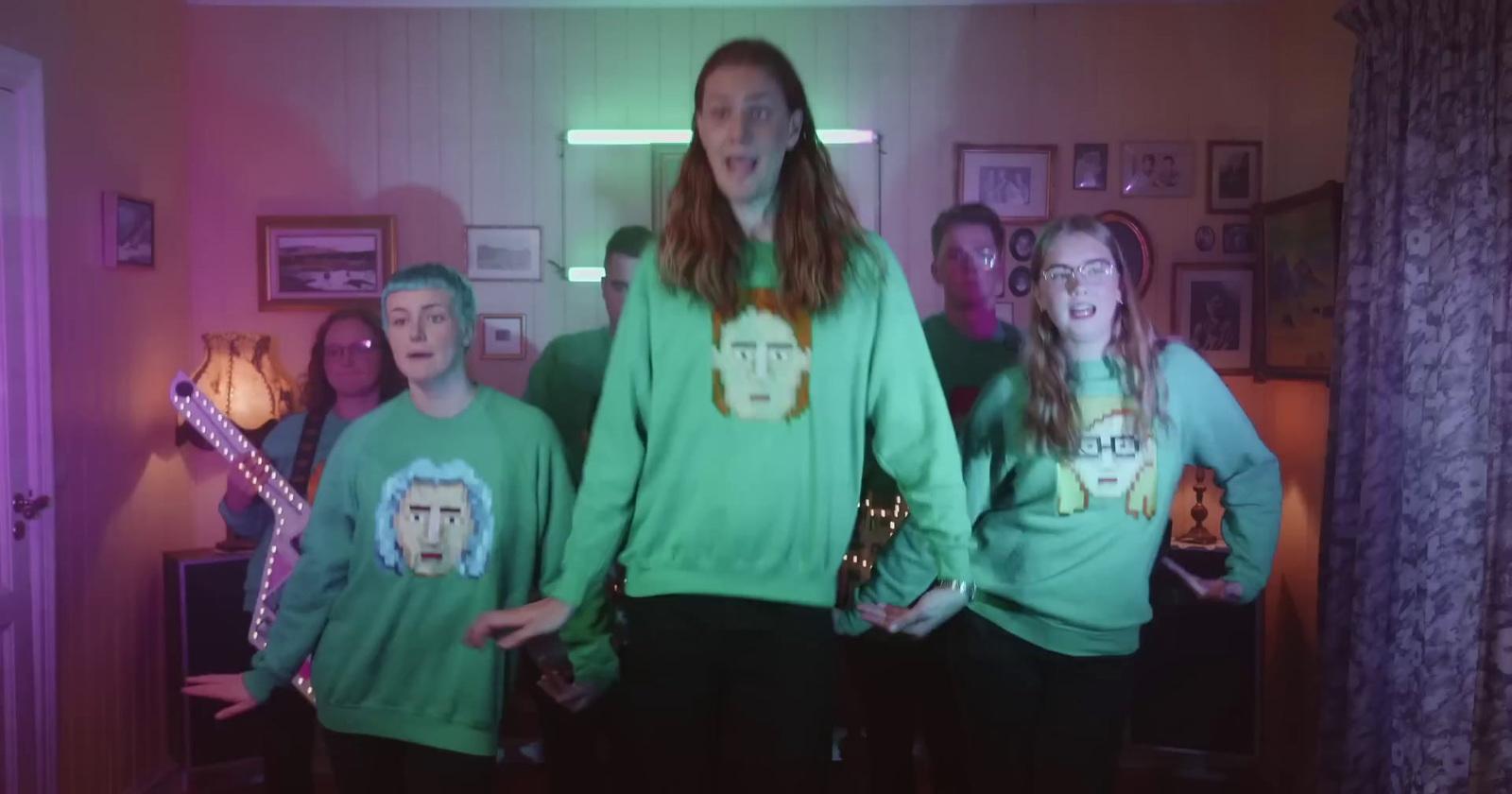 a group of people standing in a room