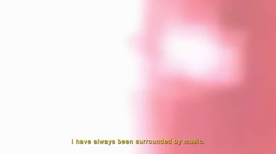 a blurry image of a pink and white background