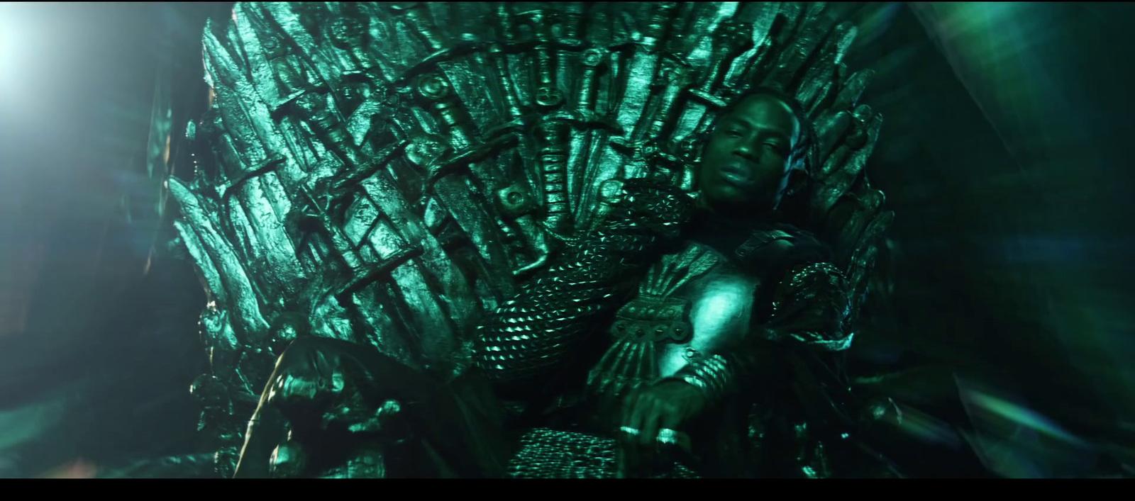 a game of throne sitting on top of a green chair