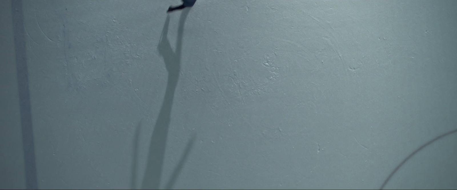 a person is skiing down a hill in the snow