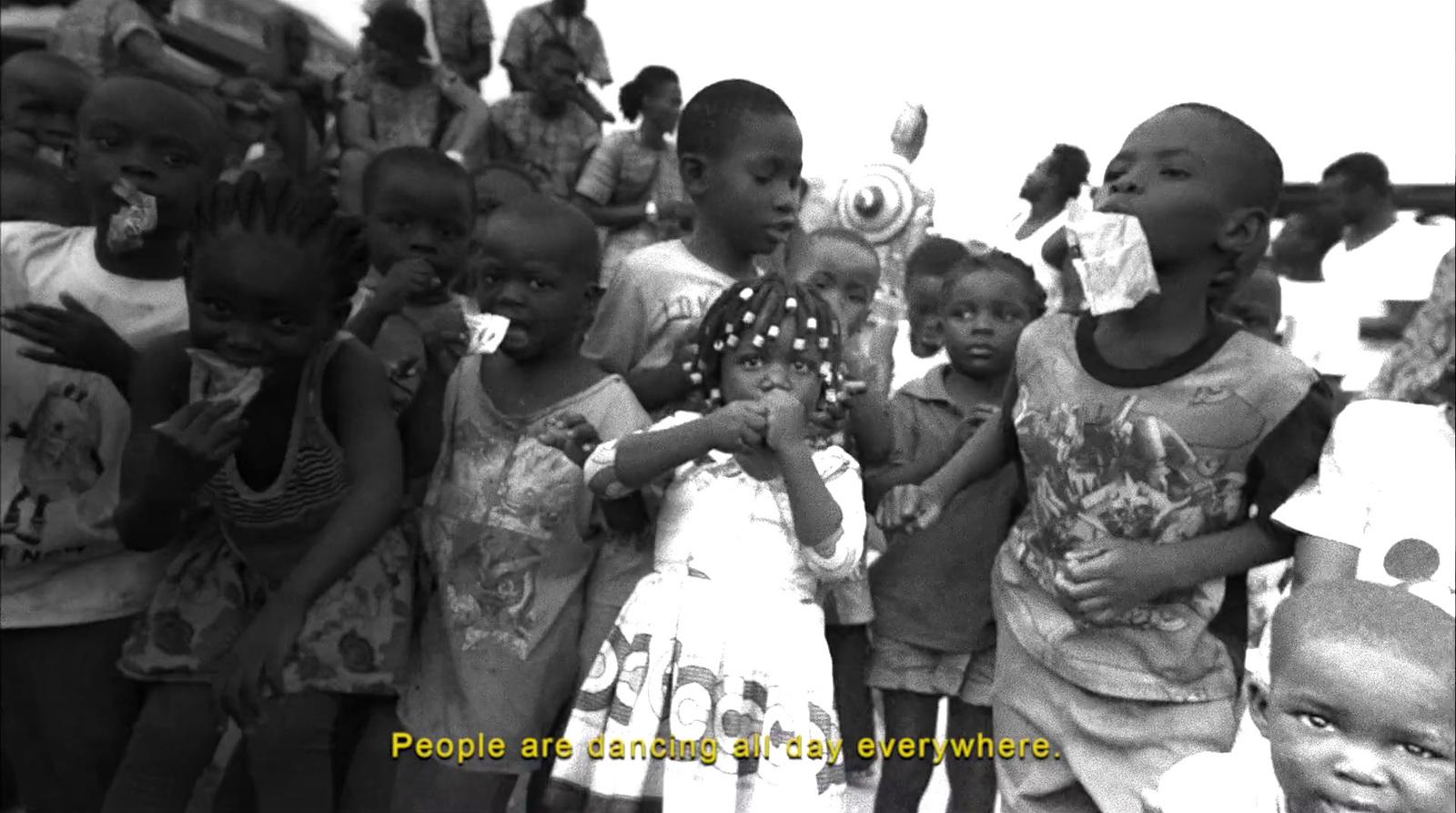 a group of children standing next to each other