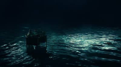 a group of people floating on top of a boat in a body of water