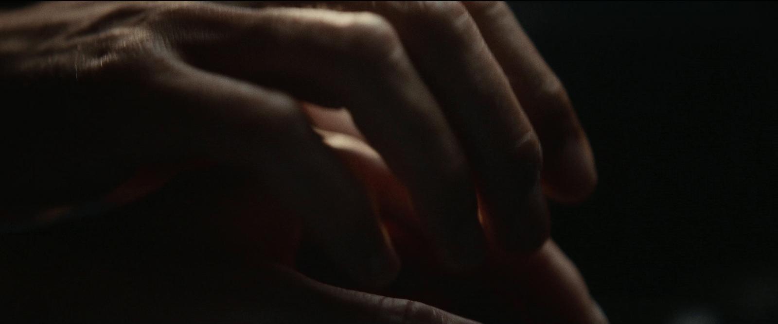 a close up of a person's hands holding something