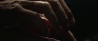 a close up of a person's hands holding something