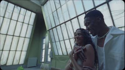 a man and a woman standing next to each other
