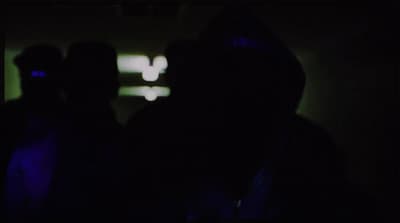 a couple of people standing next to each other