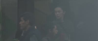 a group of people standing next to each other